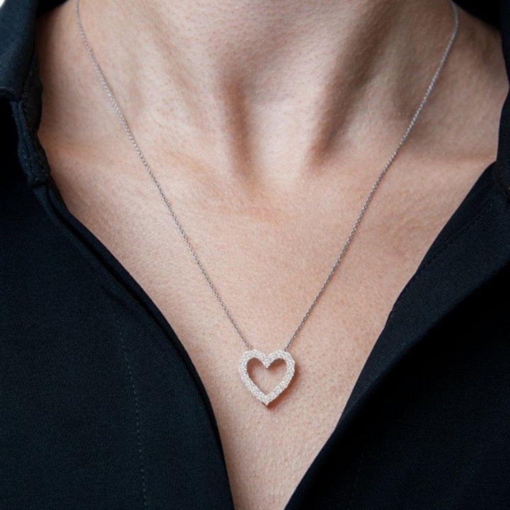 New Diamond Heart 18" pendant in sterling silver. C.t.w. 1/10 CT. t.w